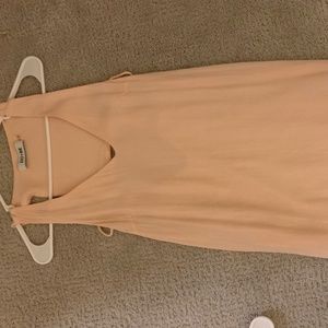 Light pink summer dress with back cut out.